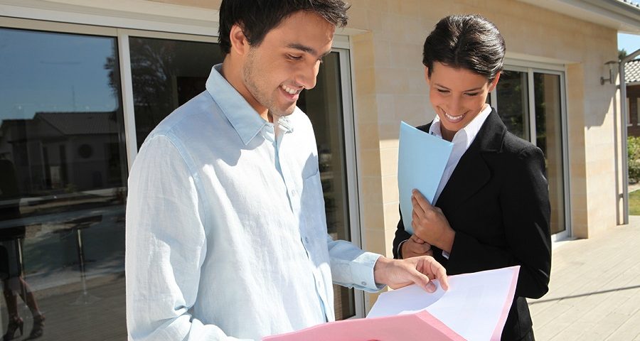 real estate agent with client